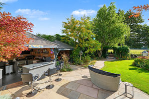 Covered bar area, Terrace and gardens- click for photo gallery